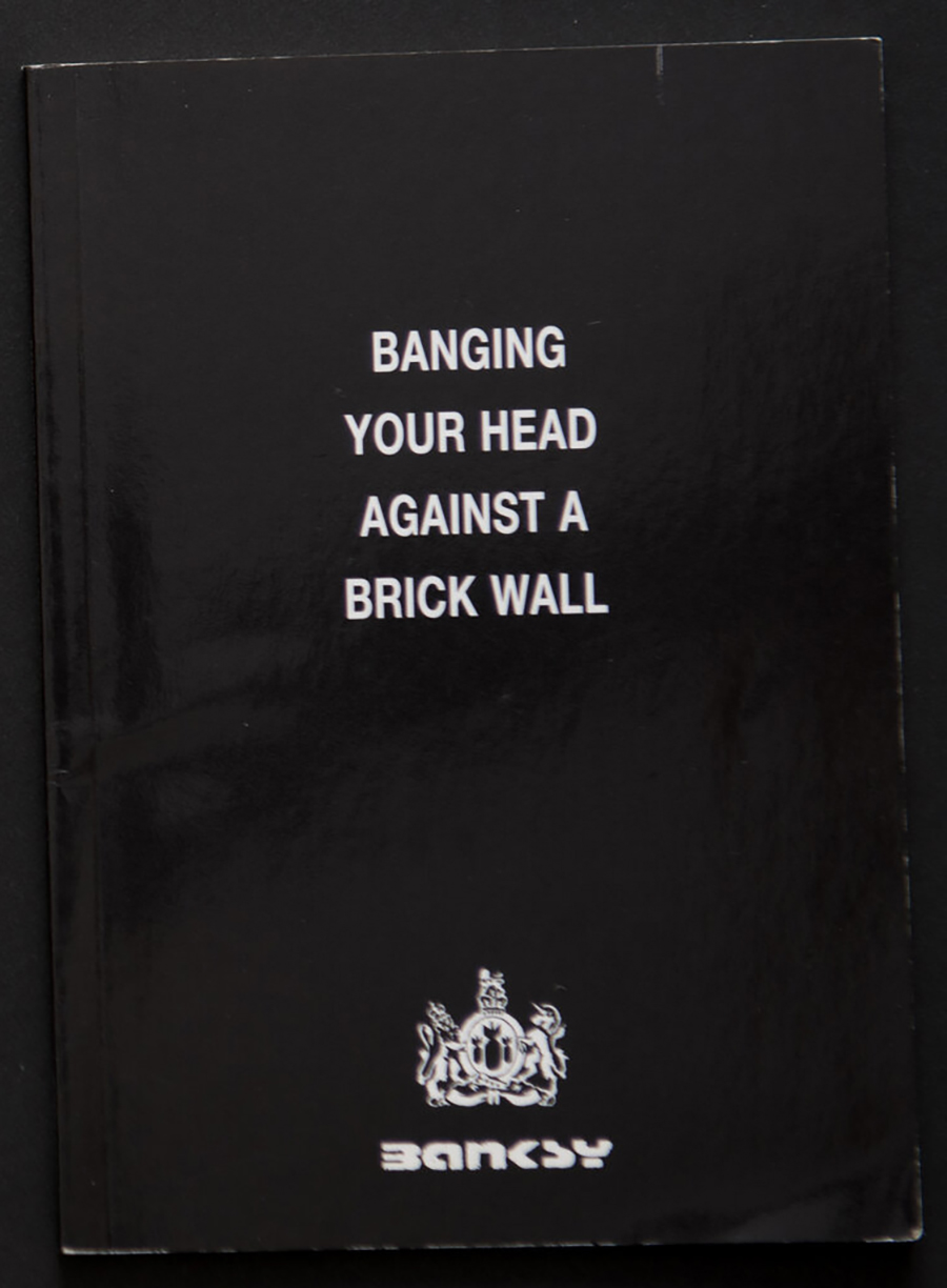 Banksy Book - Banging Your head Against a Brick Wall.